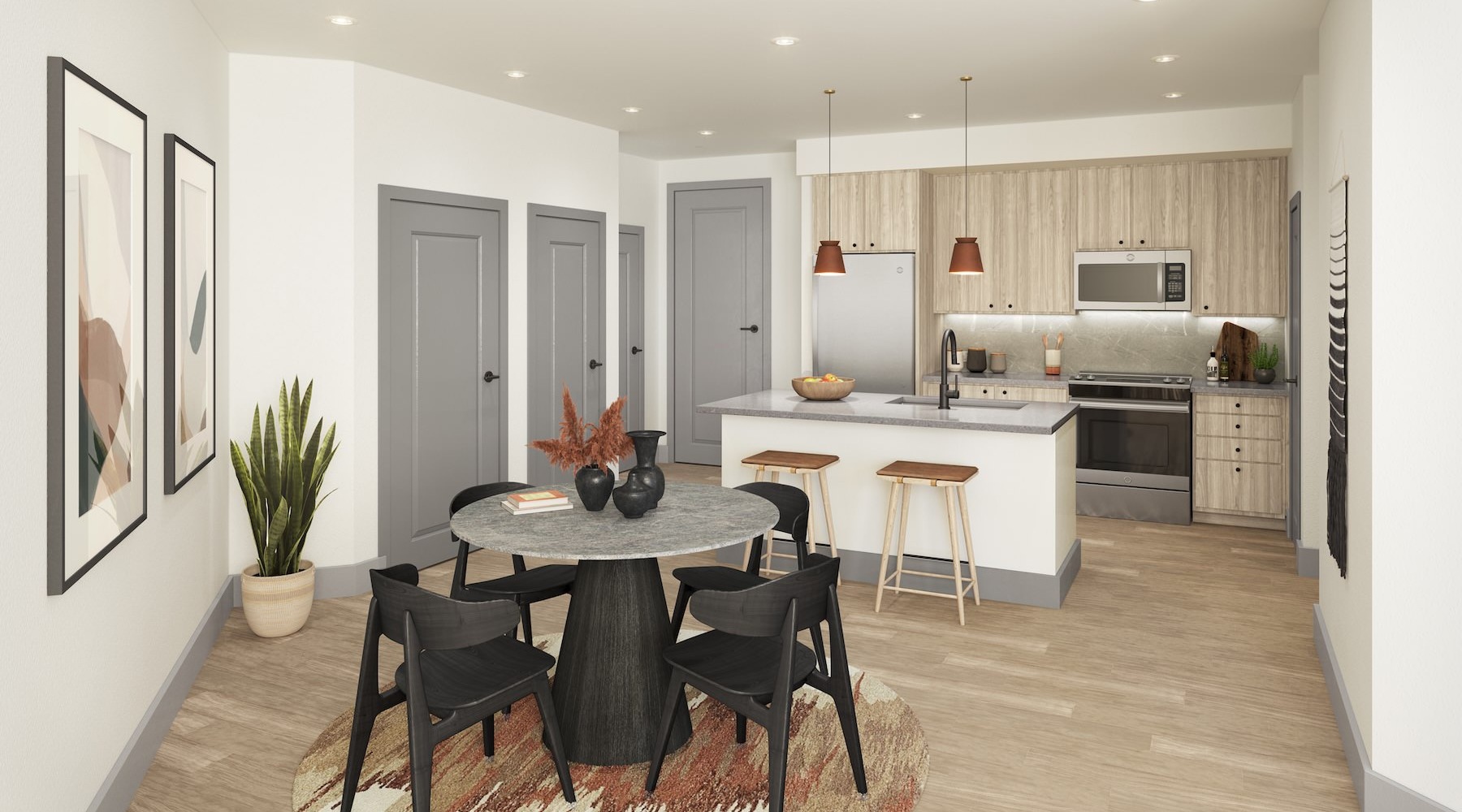 a kitchen with a dining table and chairs